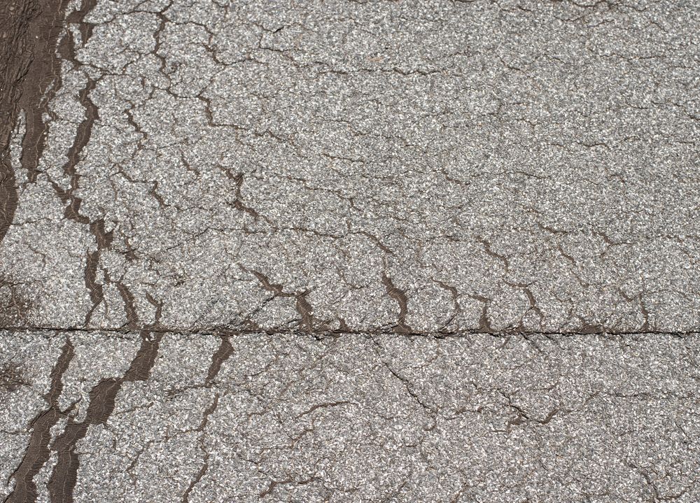 Losliggend dakleer op plat dak in Eelde